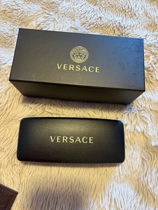 Gafas de sol Versace negras y doradas