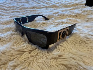 Gafas de sol Versace negras y doradas