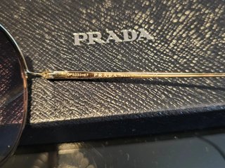 Gafas de sol Prada doradas spr 56 u mujer
