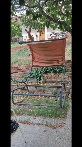 Balancín de jardín con toldo