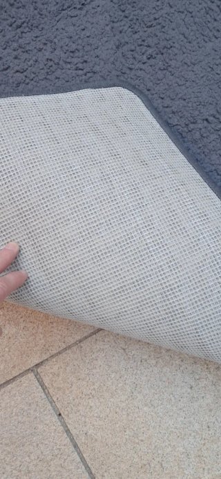 Alfombra gris de pelo