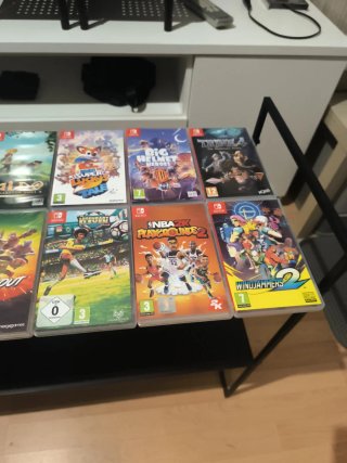 14 cajas de juegos y porta cartuchos todo por 18