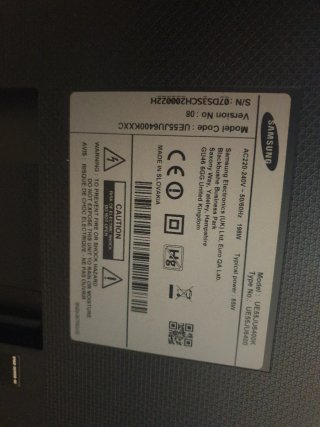 Televisor Negro 55 pulgadas con el mando