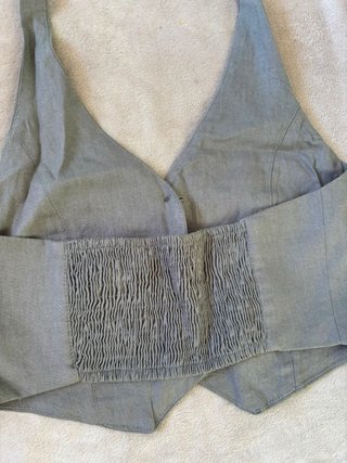Top de traje gris sin mangas