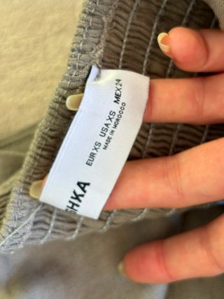 Top de traje gris sin mangas