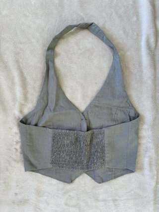 Top de traje gris sin mangas