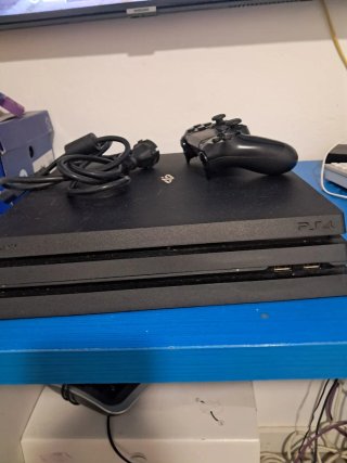 Playstation 4 Pro con mando
