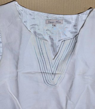 Vestido Sweet Miss lino blanco flores bordadas