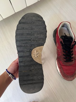 Zapatillas Premiata rojas y negras