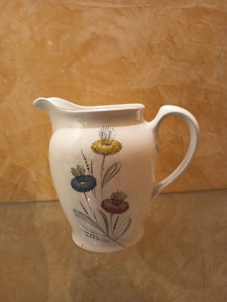 Juego de porcelana antiguo con flores