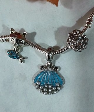 Precioso conjunto de charms
