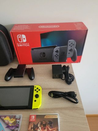 Nintendo Switch + Valigetta, Giochi e Accessori