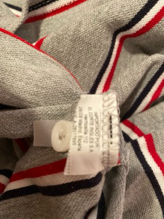 2 Polos.  Una a rayas gris y otro negro