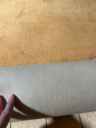 Alfombra de lana beige y naranja