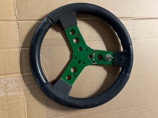 Asiento y volante de carreras