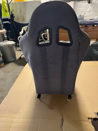 Asiento y volante de carreras