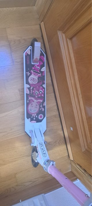 Patinete Oxelo rosa con timbre