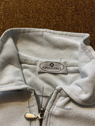 polo da donna con zip