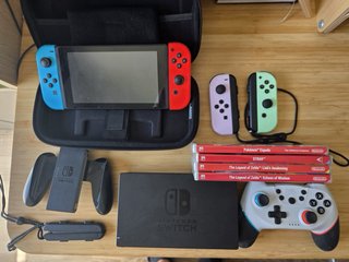 Nintendo Switch + 4 Juegos + 4 Joy-Con+Mando+Funda