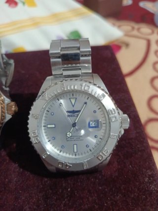 Reloj Invicta Dorado y Plateado