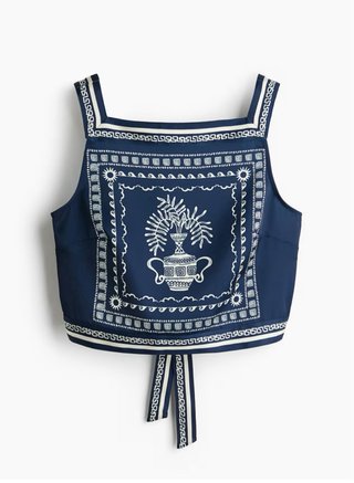 Top corto azul y blanco con estampado