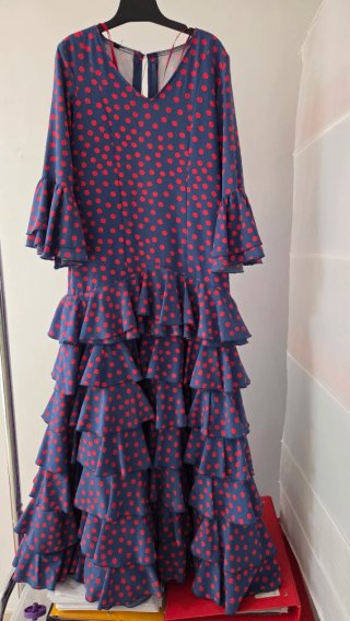 Traje de flamenca niña azul con lunares rojos