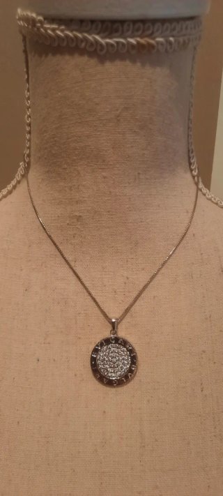 Medalla y cadena Bvlgari plata