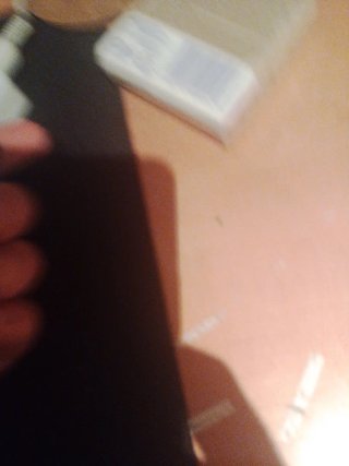 Hebilla de cinturón Gucci negra y dorada