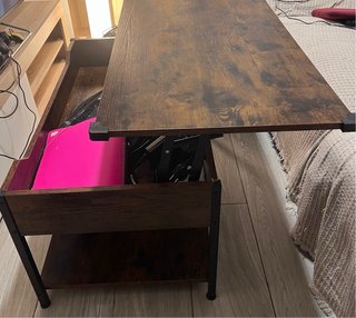 Mesa elevable salón madera con varios compatimento