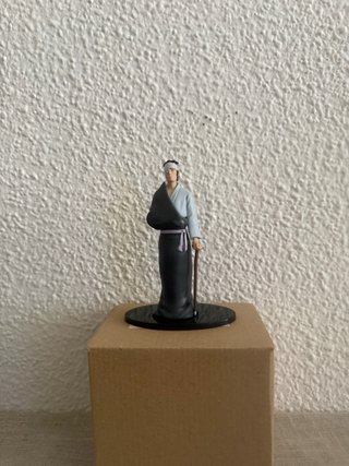 Figura Danzo con bastón