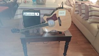 Guitarra Acústica con Amplificador