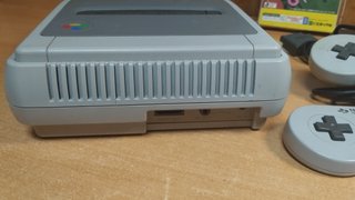 Super Famicom con 2 mandos y juego