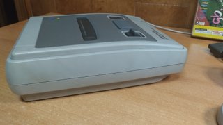 Super Famicom con 2 mandos y juego
