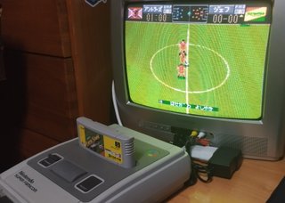 Super Famicom con 2 mandos y juego