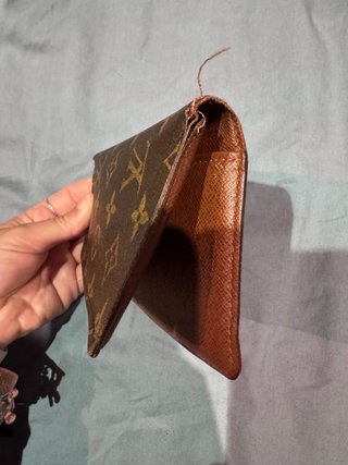 Portacarte Louis Vuitton marrone angoli scuciti