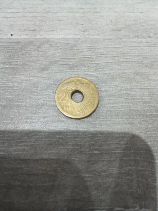 25 pesetas con agujero