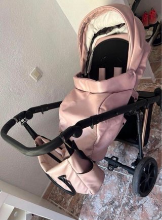Cochecito de bebé rosa