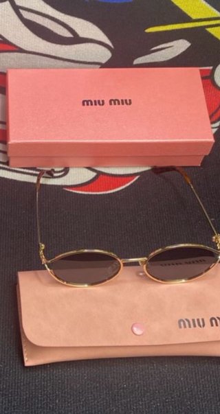 Gafas Miu Miu Ovaladas Doradas Marrones
