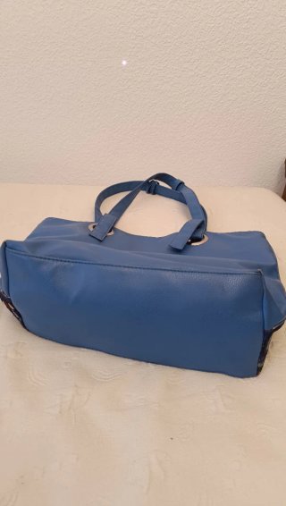 Bolso de mano estampado azul