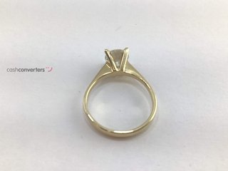 anillo oro 18k con piedra con diamante