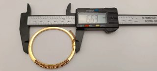 Brazalete de Oro 18k con Rubíes y Diamantes.