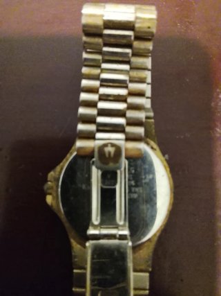 Reloj Bulova Quartz Dorado y Plateado