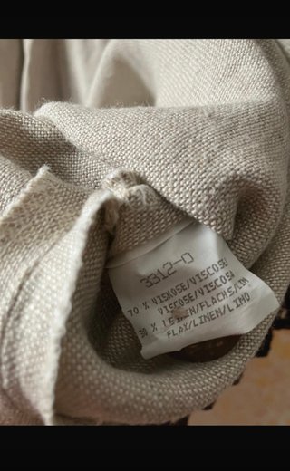 Vestito in lino beige con tasche