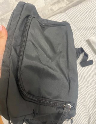 Mochila de viaje negra nueva
