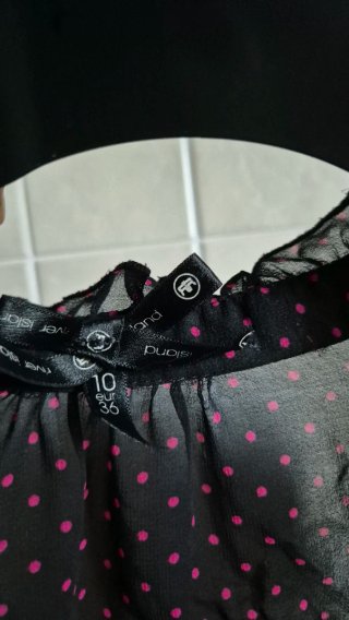 Top pois nero e fucsia
