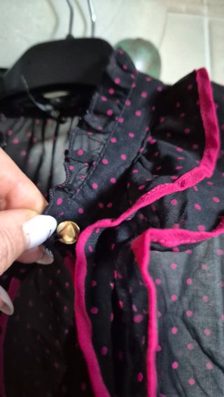Top pois nero e fucsia