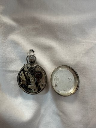 Orologio da tasca vintage in argento con base in porcellana