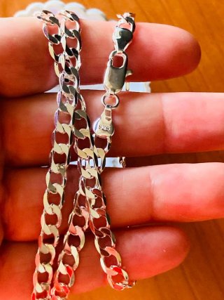 Cadena de plata y joyero