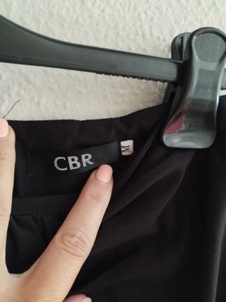 Falda tubo negra drapeada