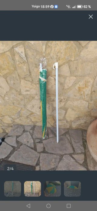 Sombrilla de playa verde y amarilla